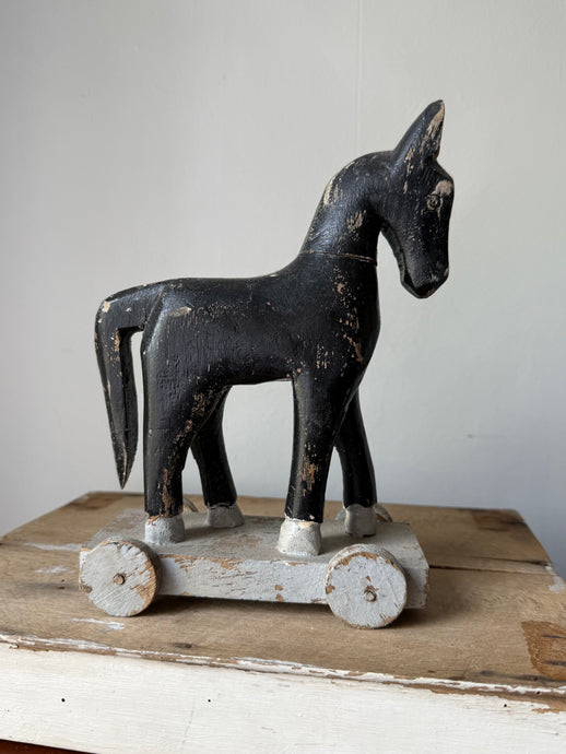 Wooden push-along horse