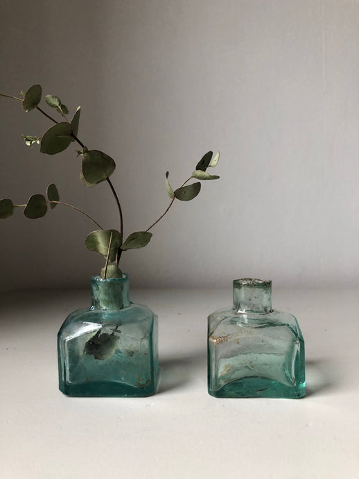 Pair of Antique Aqua Glass bottles