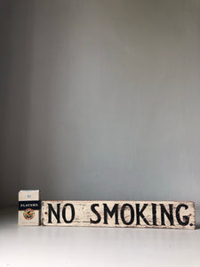 Rustic wooden NO SMOKING sign