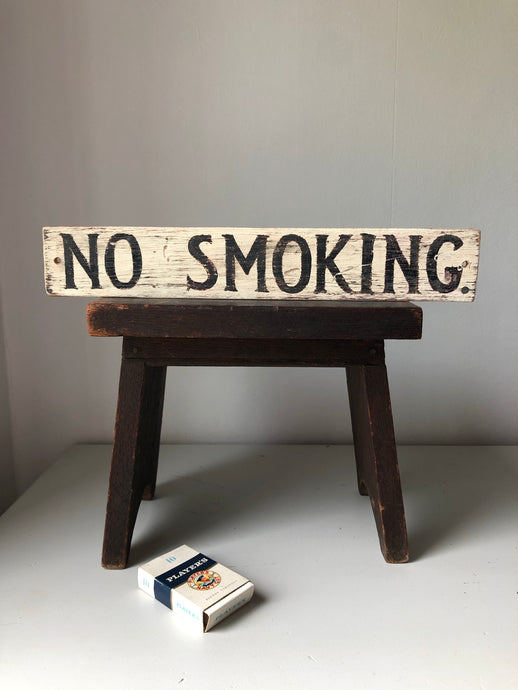 Rustic wooden NO SMOKING sign