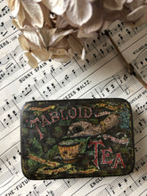 Load image into Gallery viewer, Vintage Tabloid Tea tin