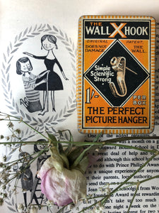 Vintage ‘Wall Hook’ orange tin